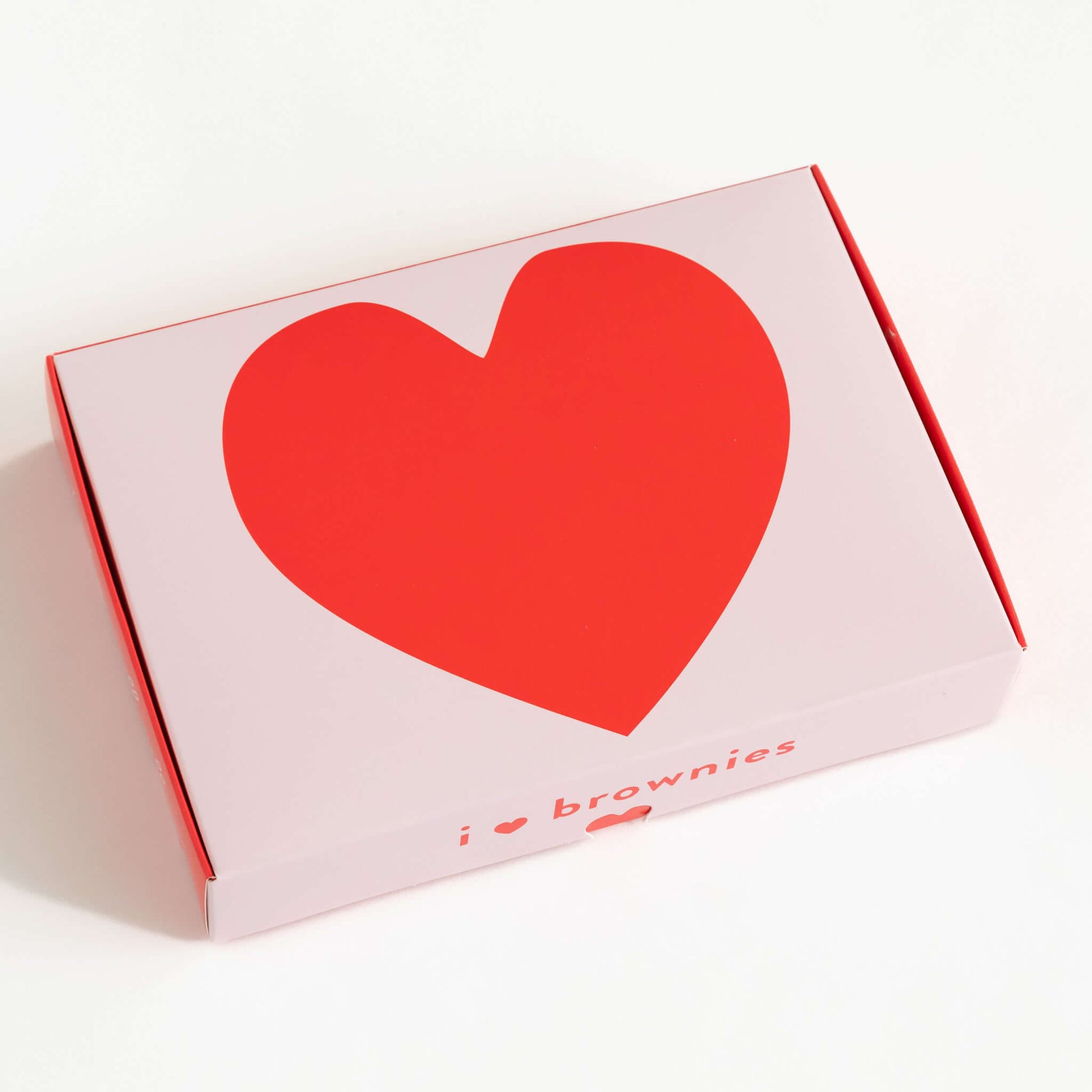 Box of 12 gluten & dairy-free chocolate heart-shaped brownies, suitable for same-day delivery in Brisbane and Australia wide delivery.