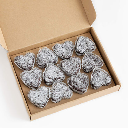 Box of 12 gluten-free mixed flavour chocolate heart-shaped brownies, suitable for same-day delivery in Brisbane and Australia wide delivery.